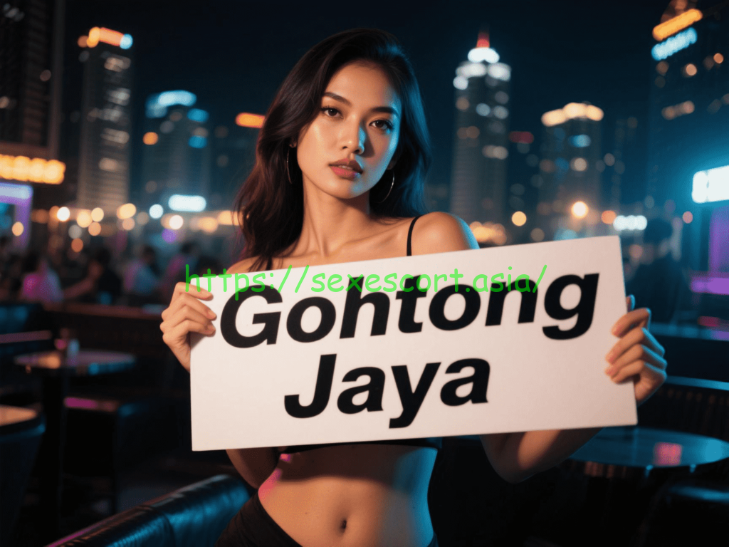Woman holding sign: Gohtong Jaya