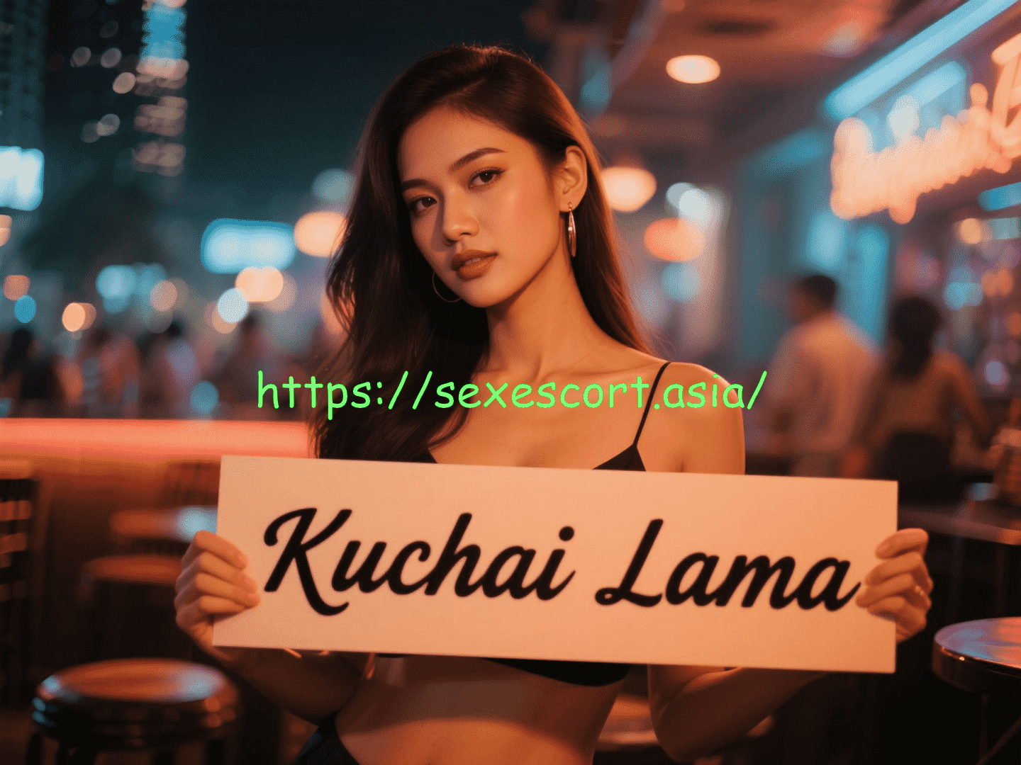 Woman holding sign: Kuchai Lama